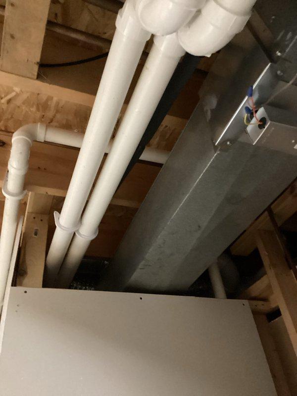 Performed routine tune-up on residential HVAC system, including inspection of the furnace unit and associated Honeywell control components. Examined PVC ventilation piping and connections for proper installation and functionality. Confirmed all electrical wiring connections were secure and operational. System is now functioning within normal parameters.