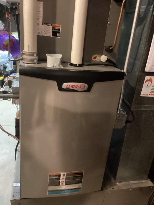 Performed routine tune-up service on Lennox HVAC furnace system with integrated Aprilaire humidifier. Inspected all components including ductwork, PVC exhaust/intake pipes, and electrical connections. System is functioning properly with no operational issues identified. Replaced air filter with new Filtrete filter to maintain optimal airflow and efficiency.