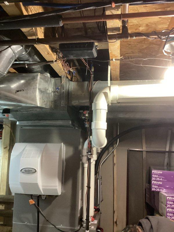 Performed routine tune-up service on Lennox HVAC furnace system with integrated Aprilaire humidifier. Inspected all components including ductwork, PVC exhaust/intake pipes, and electrical connections. System is functioning properly with no operational issues identified. Replaced air filter with new Filtrete filter to maintain optimal airflow and efficiency.