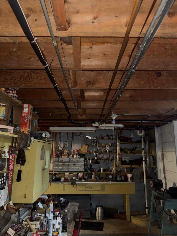 Conducted thorough inspection of basement HVAC and ductwork system. Identified aging galvanized metal ducts with potential airflow restrictions and recommended replacement. Evaluated existing mechanical equipment mounted against concrete block wall for compatibility with new ductwork configuration.