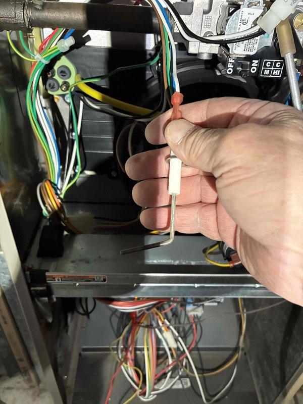 Performed comprehensive tune-up service on HVAC system including inspection of electrical connections and components using hex key tools for proper tightening. Conducted pressure testing with digital manometer (Model 620) which indicated system pressure at 3.37 InWc, confirming proper gas pressure within manufacturer specifications for optimal furnace operation. All control wiring was checked for secure connections and proper routing to ensure safe, reliable system performance.