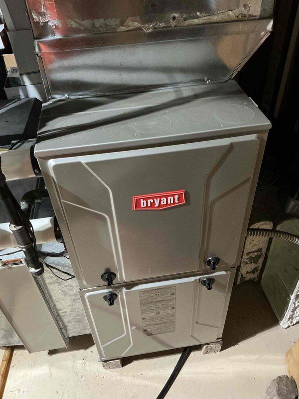 Completed prepaid maintenance service on Bryant furnace system. Performed visual inspection of ductwork revealing some minor dust accumulation and a small area of discoloration that may require future attention. System appears to be in normal operating condition with all connections intact.