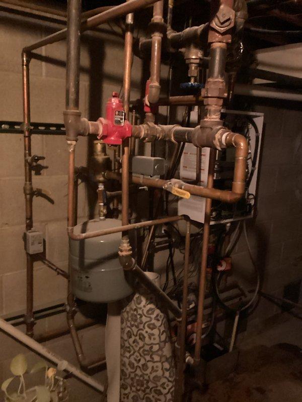 Performed routine maintenance on residential boiler system, which included inspection of heat exchanger, control panel functioning (confirmed 140°F operating temperature), and examination of all electrical components. Checked plumbing connections throughout the hydronic system, inspected expansion tank and water treatment equipment, and verified proper operation of pressure regulation valve. All components functioning within normal parameters.