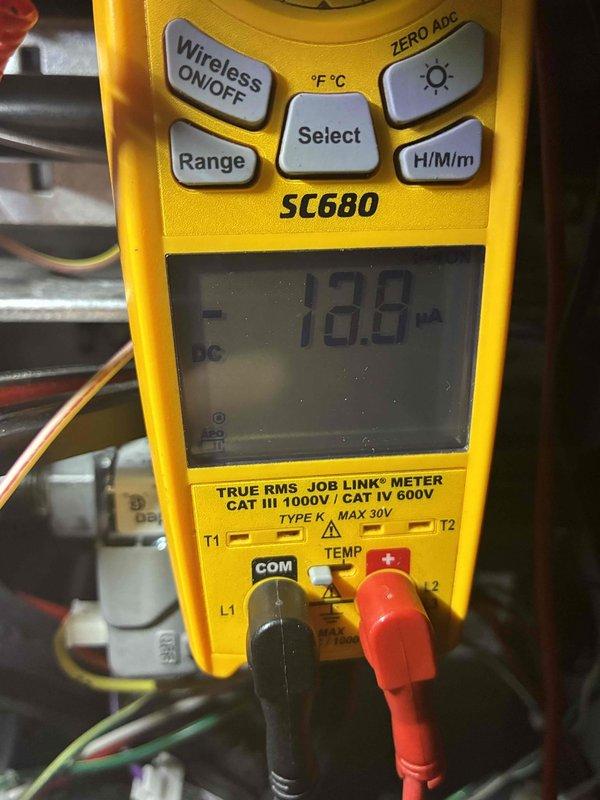 Performed comprehensive tune-up service on HVAC system including electrical testing with Fieldpiece SC680 multimeter. Conducted microamp measurements (-18.8 μA DC) and verified system voltage reading of 56.93V. All electrical parameters confirmed within manufacturer specifications, ensuring optimal system operation and performance.