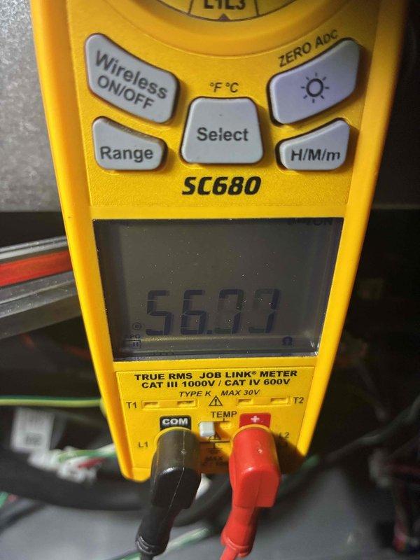 Performed comprehensive tune-up service on HVAC system including electrical testing with Fieldpiece SC680 multimeter. Conducted microamp measurements (-18.8 μA DC) and verified system voltage reading of 56.93V. All electrical parameters confirmed within manufacturer specifications, ensuring optimal system operation and performance.