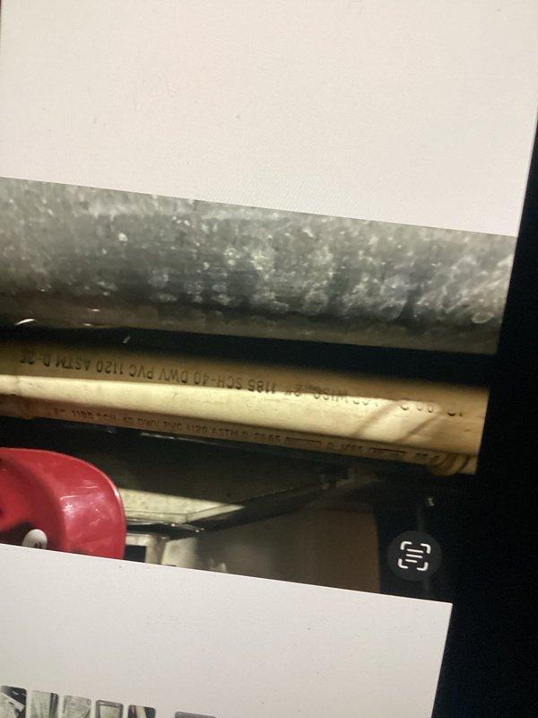 Responded to no-heat service call for aging system (10+ years). Inspection revealed faulty integration between copper piping and PVC drain components. Replaced damaged section, cleaned buildup in exhaust/intake assembly, and restored proper heating operation. System now functioning within normal parameters.