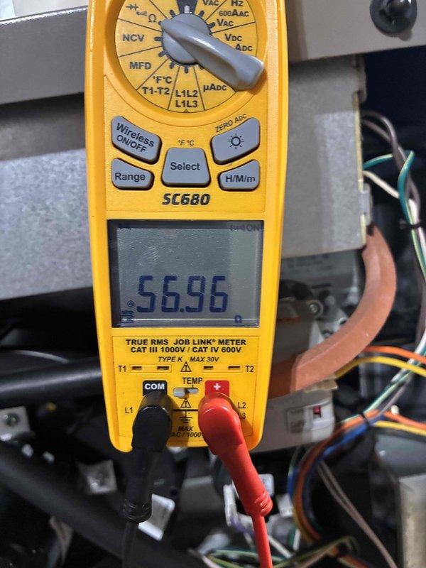 Performed scheduled maintenance service on HVAC system. Conducted electrical diagnostics using SC680 multimeter, measuring voltage at 56.96V. Checked system temperatures with PDT650 pocket thermometer, which displayed reading of 1445°F.