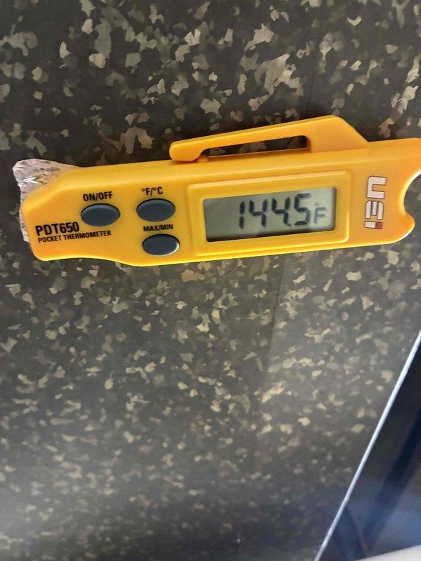 Performed scheduled maintenance service on HVAC system. Conducted electrical diagnostics using SC680 multimeter, measuring voltage at 56.96V. Checked system temperatures with PDT650 pocket thermometer, which displayed reading of 1445°F.