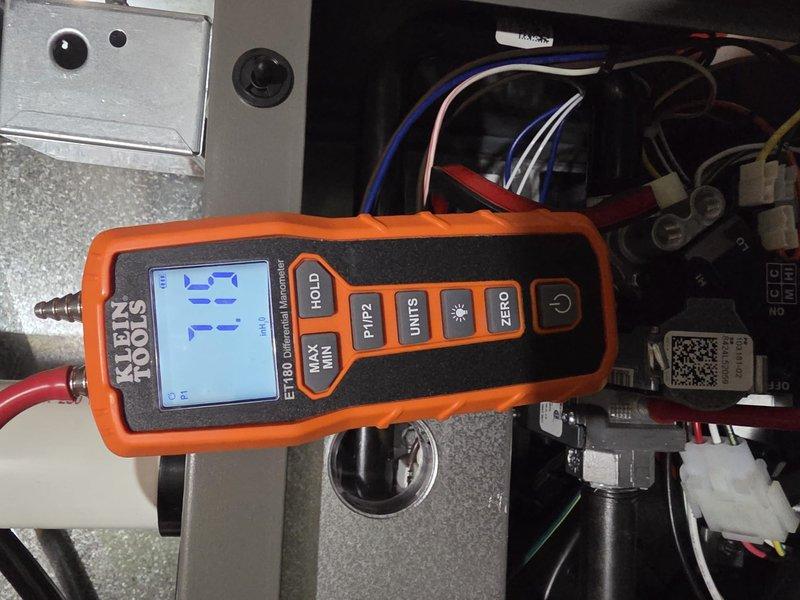 Completed furnace installation with comprehensive system testing. Measured gas pressure at 15.5 WC with Klein Tools manometer and verified supply temperature at 171°F with differential thermometer. All electrical connections properly secured and system performing to manufacturer specifications.