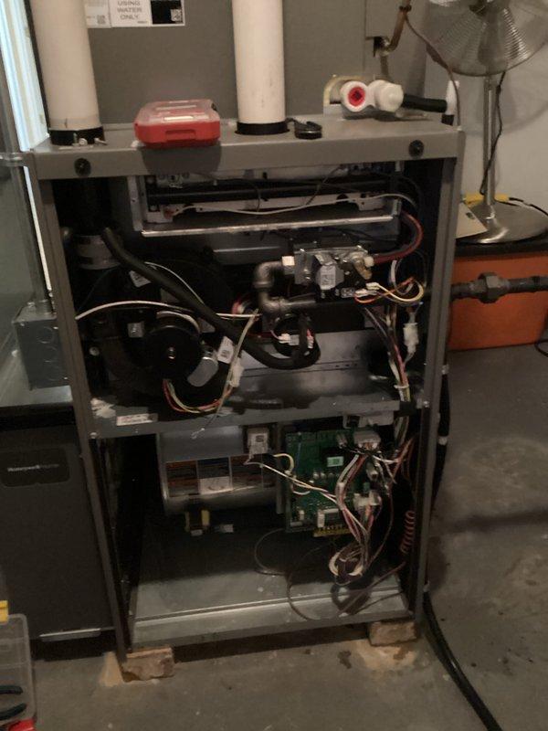 Performed comprehensive tune-up on residential furnace unit including full inspection of internal components, electrical connections, and gas line system. Conducted diagnostic testing using digital manometer to verify proper pressure readings and system operation parameters. Cleaned accessible components, checked safety controls, and confirmed proper ignition sequence with all systems functioning within manufacturer specifications.