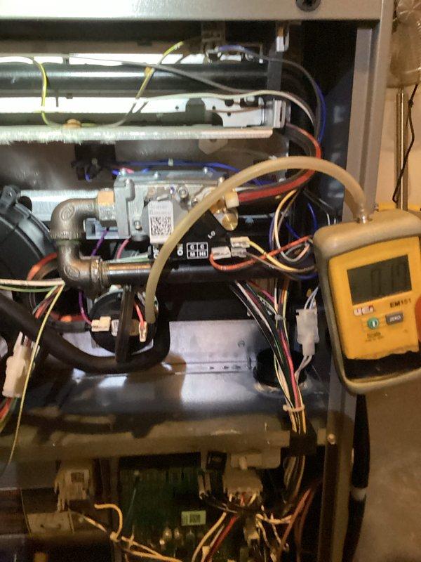 Performed comprehensive tune-up on residential furnace unit including full inspection of internal components, electrical connections, and gas line system. Conducted diagnostic testing using digital manometer to verify proper pressure readings and system operation parameters. Cleaned accessible components, checked safety controls, and confirmed proper ignition sequence with all systems functioning within manufacturer specifications.