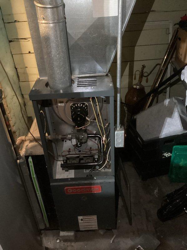 Responded to no-heat service call for aging Goodman furnace. Upon inspection, identified failed blower motor and worn wiring as root cause of heating failure. Replaced motor assembly, reconnected electrical components, and performed comprehensive system test to confirm proper operation and restore heat to residence.