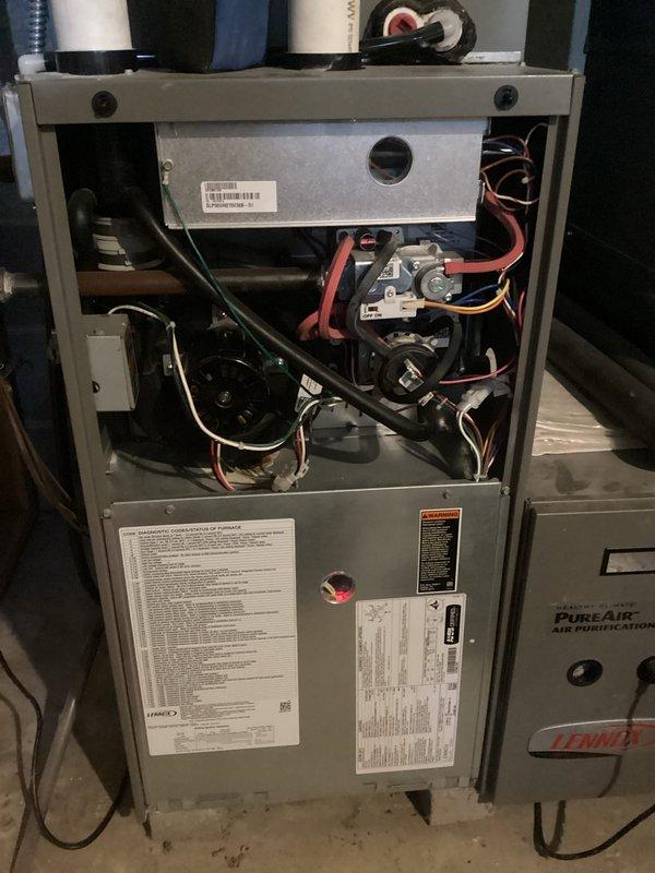 Performed comprehensive tune-up service on Lennox furnace system with integrated PureAir Air Purification component. Inspection revealed all internal electrical components, wiring connections, and mechanical parts in normal working condition with no signs of damage or deterioration. Verified proper operation of drainage system, including PVC piping and connections, and confirmed appropriate airflow through ductwork.