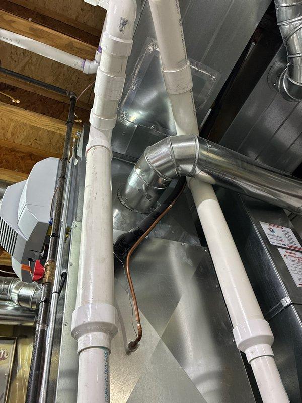 Performed preventative maintenance inspection on HVAC system. Verified level installation of equipment and inspected ductwork, including metal transitions and PVC components. All connections were confirmed secure with proper alignment. System appears to be in good working condition with no immediate concerns identified.