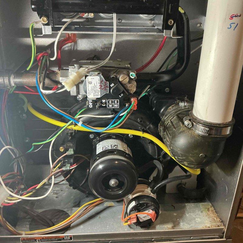 Completed inspection and repair of gas furnace exhibiting ignition issues. Removed front panel to access internal components, examined control board and gas valve functionality, and performed a thorough cleaning of the flame sensor. System was fully tested after repair, confirming proper ignition sequence and normal operation.
