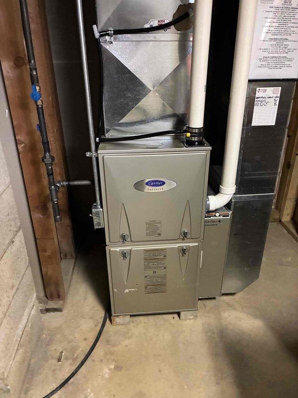 Performed scheduled tune-up service on Carrier Infinity furnace system. Inspected unit installation, ductwork connections, and PVC venting pipes. Replaced standard 20"x25"x4" Honeywell Home air filter with new one of matching specifications (actual size 19-15/16"x24-7/8"x4-3/8").