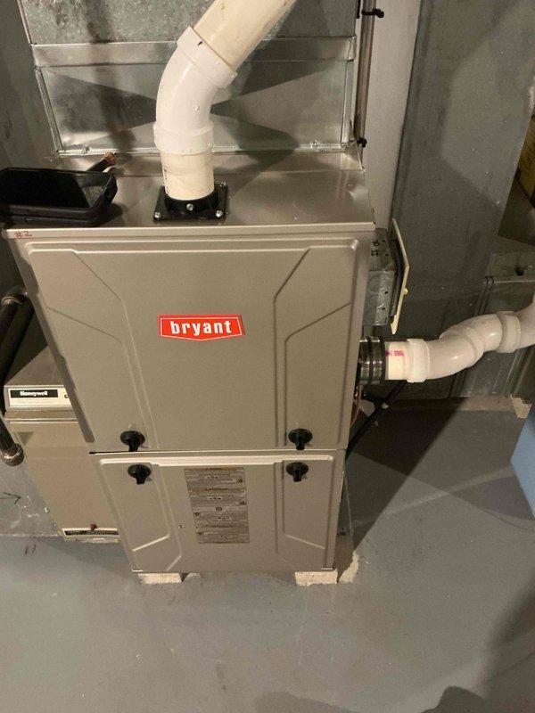 Performed regular maintenance inspection on customer's Bryant furnace located in basement. System appeared to be in normal working condition with proper installation of PVC venting. Visual inspection showed no obvious damage or irregularities to the unit or connected Honeywell control module. Recommended continued adherence to maintenance schedule to ensure optimal performance.