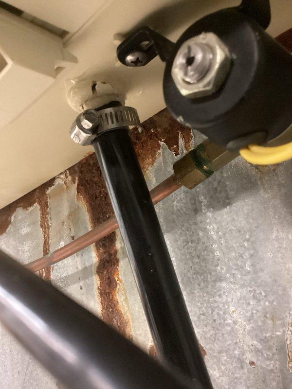 Performed routine HVAC system tune-up including inspection of existing ductwork and ventilation components. Checked PVC drainage pipes for proper installation and functionality. Examined furnace unit for operational efficiency and inspected nearby plumbing components, noting some rust/corrosion on metal surfaces that should be monitored but does not currently affect system performance.