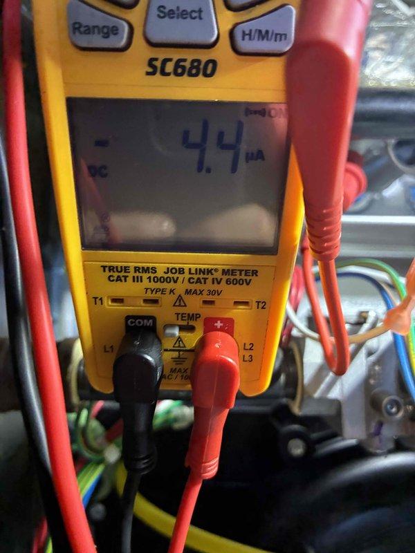 Performed seasonal tune-up on Carrier furnace. Conducted amperage test using SC680 multimeter, recording 4.4 μA current draw which falls within normal operating parameters. Inspected all electrical connections, PVC venting, and visible components - all in good working condition with no signs of wear or damage. System is operating efficiently and no repairs were needed.