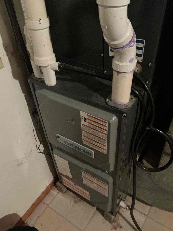 Performed routine maintenance tune-up on Daikin HVAC system. Inspected PVC exhaust/intake pipes and electrical connections, finding them in proper working order. Examined ductwork which showed normal dust accumulation but no significant blockage or damage requiring immediate attention.