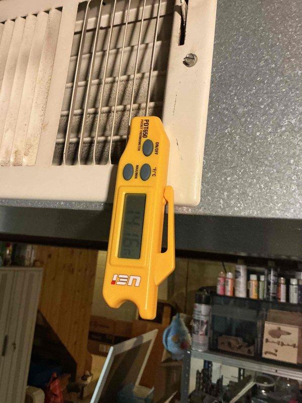 Performed scheduled maintenance service on HVAC system. Conducted thorough inspection of ductwork, noting moderate dust accumulation and residue buildup on interior surfaces. Measured airflow and temperature at registers using UEi digital meter, confirming system is operating within normal parameters despite minor airflow restriction.