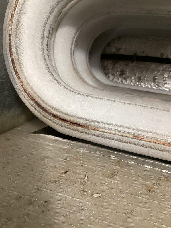 Performed routine HVAC tune-up service, inspecting system components and connections. Noted minor dust accumulation in the air duct connection with early signs of rust formation along metal seams. Examined cooling coils which showed slight discoloration and minor corrosion but remain in functional condition.