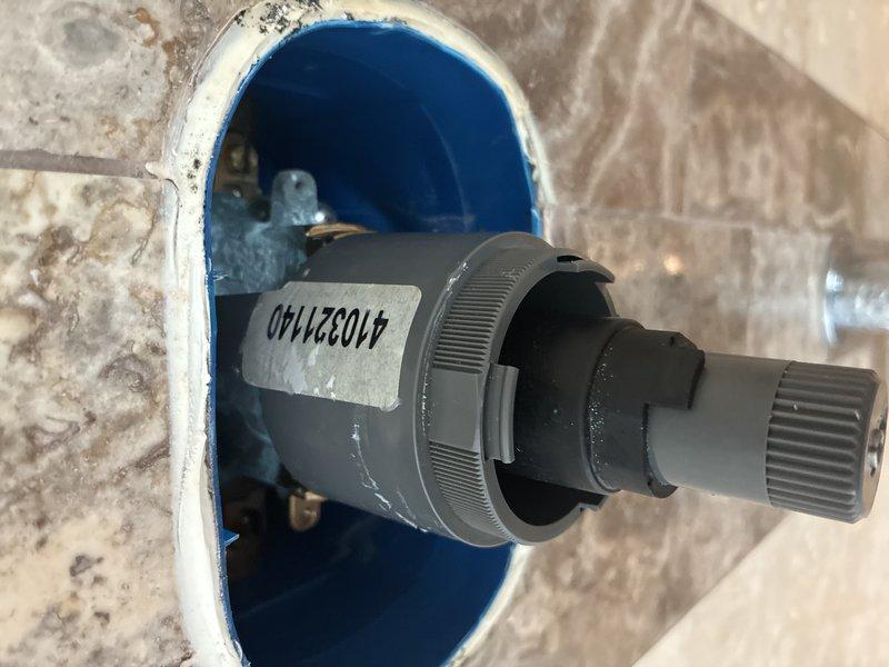 Conducted comprehensive inspection of shower valve assembly in tiled enclosure. Identified control valve with reference number 41023140, which was properly installed with no visible damage. Noted functional operation of the valve mechanism and confirmed no leaks in the surrounding plumbing connections.