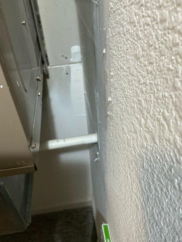 Conducted inspection of existing HVAC system installation, focusing on air handler mounting and plumbing connections. Documented current configuration including wall clearance and electrical junction box setup. Prepared estimate for complete system replacement with attention to proper fitting of equipment against interior wall and reconnection of existing plumbing with appropriate valves and conduit routing.