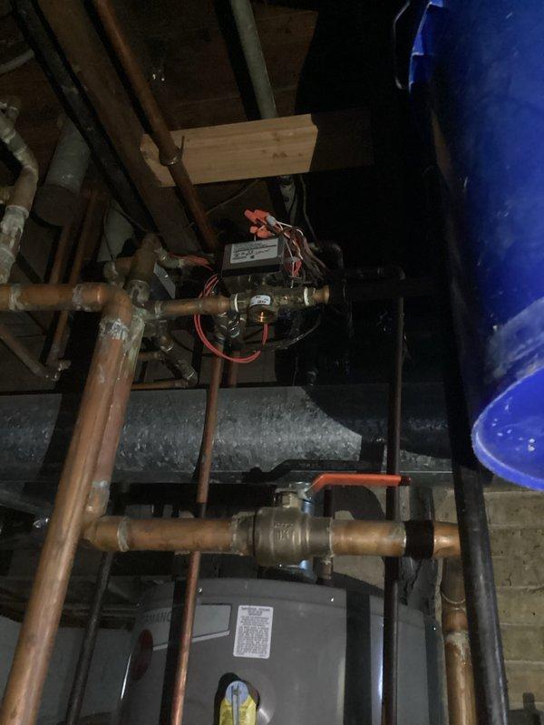 Performed comprehensive tune-up on hydronic heating system, inspecting circulation pump and associated controls. Examined copper supply/return lines for integrity and proper connection, and verified proper operation of valve assembly. System now functioning within normal parameters with no leaks detected.
