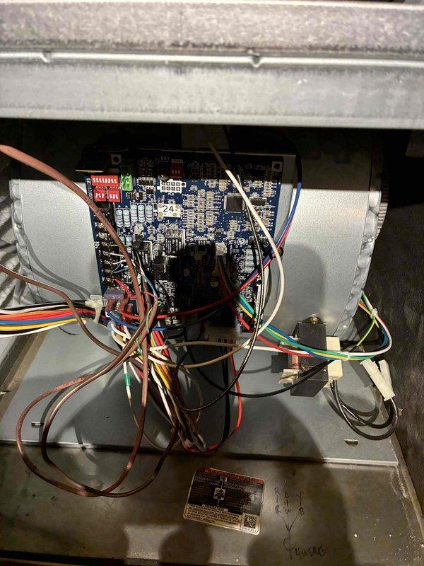 Performed scheduled maintenance visit on residential HVAC system. Inspected Honeywell digital thermostat and control wiring connections, verified proper operation of circuit board components, and ensured all wire connections were secure and properly terminated.