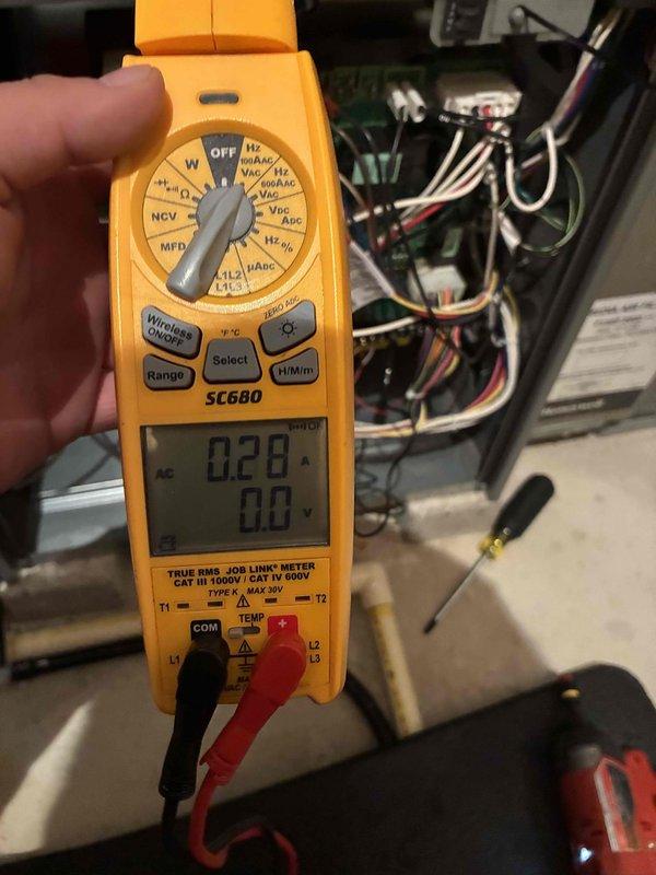 Performed routine air conditioning tune-up with comprehensive electrical diagnostic testing using SC680 digital multimeter. Measured system voltage (0.28V) and microamp readings (8.7µA) at control board to verify proper electrical operation. All readings within manufacturer specifications; system functioning normally.
