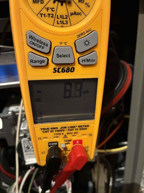 Performed routine air conditioning tune-up with comprehensive electrical diagnostic testing using SC680 digital multimeter. Measured system voltage (0.28V) and microamp readings (8.7µA) at control board to verify proper electrical operation. All readings within manufacturer specifications; system functioning normally.