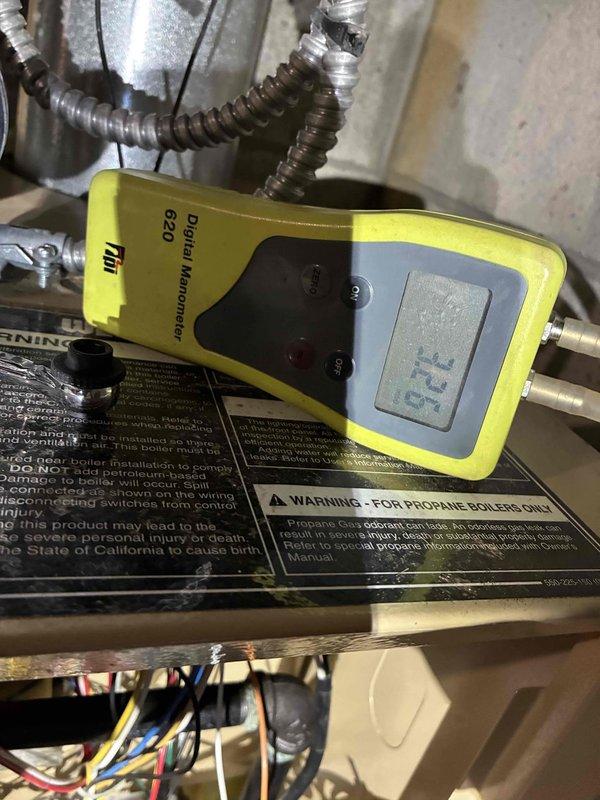Performed annual tune-up on Weil-McLain propane boiler system. Conducted gas pressure test with TPI 620 manometer, confirming 7.55" WC gas pressure within manufacturer specifications. Inspected expansion tank, pressure gauge, and all copper/metal piping connections for proper operation and signs of leakage; all components functioning correctly.