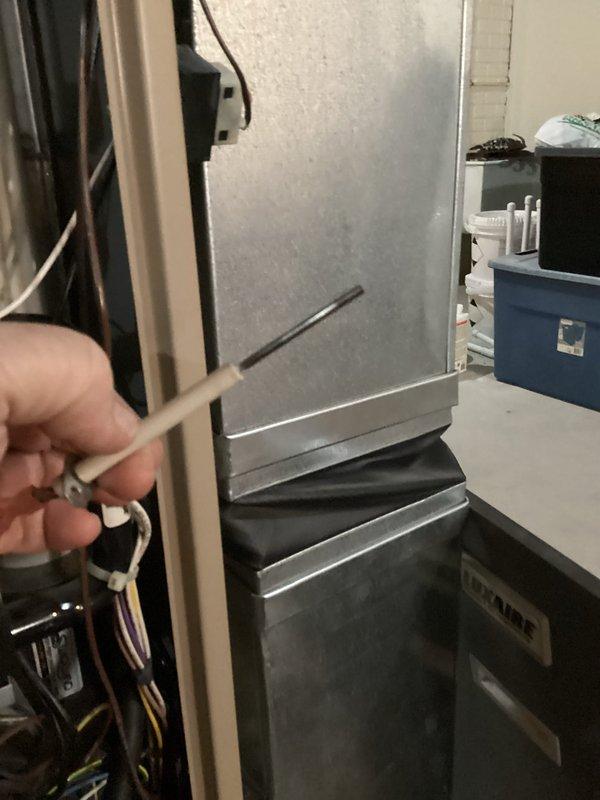 Performed comprehensive tune-up on residential HVAC system. Inspected furnace interior components including heat exchanger, electrical connections, and blower assembly - all found in satisfactory working condition. Serviced unit using standard maintenance tools and verified proper operation before closing access panel.