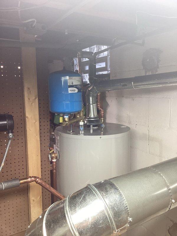 Successfully installed a new Lennox boiler system with complete integration of the existing water heater setup. Mounted and connected all required components including expansion tank, circulation pump, and proper insulation of copper piping. System was fully tested and is operating at optimal efficiency with all connections secure and properly vented through the exterior wall.