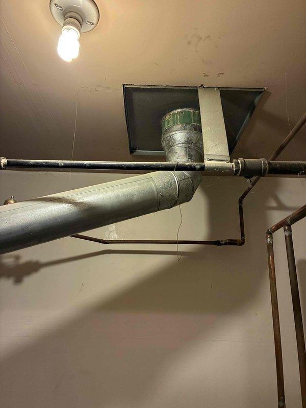 Performed comprehensive tune-up on residential heating system, including inspection of furnace unit, associated copper piping, and ventilation components. Examined ceiling ductwork for proper airflow and identified minor water staining near duct connections. Cleaned system components and verified proper operation of all heating elements.