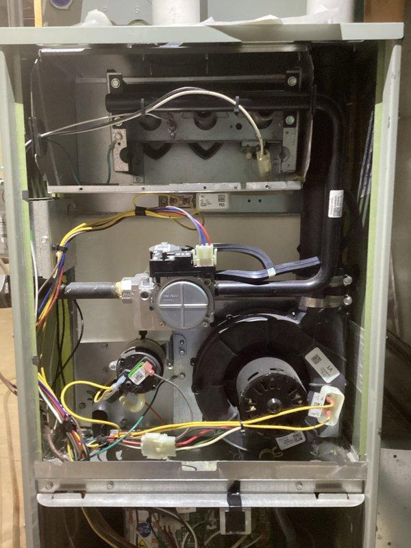Performed comprehensive HVAC tune-up service including inspection of furnace internal components and verification of proper leveling. Examined blower motor assembly, control wiring connections, and gas valve components for proper operation. Confirmed system is level using precision measuring equipment to ensure optimal performance and efficiency.