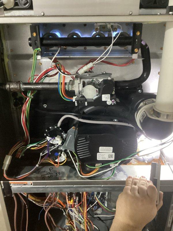 Performed diagnosis and repair of heating system, identifying a failed blower motor. Removed defective component, installed new OEM blower motor assembly with associated wiring harness, and verified proper system operation with flame sequence and airflow testing.