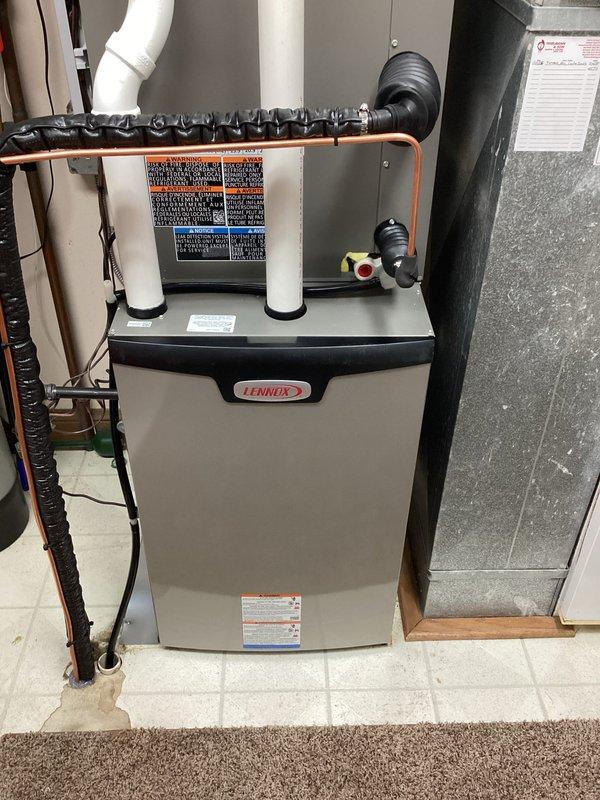 Installed new Lennox complete HVAC system in basement utility area, including furnace with proper PVC ventilation piping and insulated refrigerant lines. System was professionally mounted with all required electrical connections, and all components were tested to ensure proper functionality before completion.