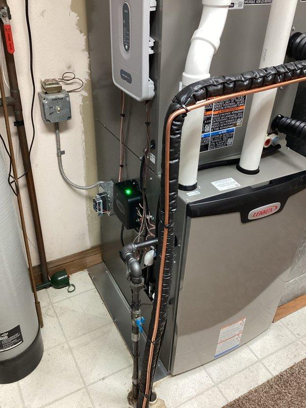 Installed new Lennox complete HVAC system in basement utility area, including furnace with proper PVC ventilation piping and insulated refrigerant lines. System was professionally mounted with all required electrical connections, and all components were tested to ensure proper functionality before completion.