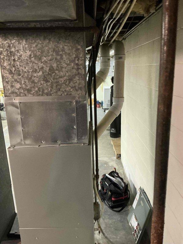 Conducted comprehensive assessment of existing HVAC system in residential basement mechanical room, including evaluation of furnace/air handler unit, associated ductwork, and PVC ventilation components. Inspection also included examination of electrical circuit breaker panel to verify proper power supply and capacity for potential replacement equipment.