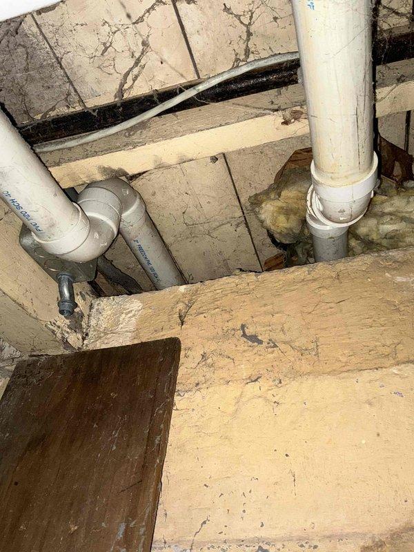 Conducted assessment of basement HVAC system for potential replacement. Identified aging equipment and potential installation challenges posed by existing plumbing configuration. Evaluated space constraints around utility area where water treatment systems are installed. Documented structural concerns including wall cracks that may require attention during new system installation.