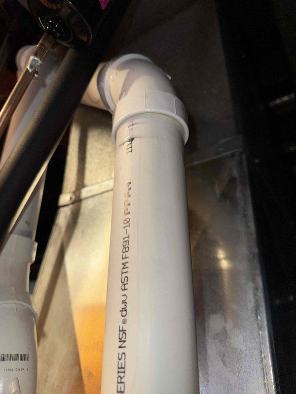 Performed comprehensive HVAC tune-up service on residential furnace system. Inspected interior components including motor assembly, wiring connections, and heat exchanger for proper operation. Examined connected PVC venting system to ensure proper installation and ventilation compliance with NSF standards.