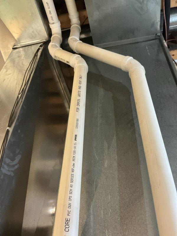 Completed comprehensive tune-up of HVAC system, inspecting both the condensate drainage assembly and furnace components. Verified proper installation and function of PVC condensate drain lines, confirming no blockages or leaks in the drainage system. Examined furnace gas valve assembly, electrical connections, and blower motor, ensuring all components were operating within specifications and showing no signs of wear or damage.