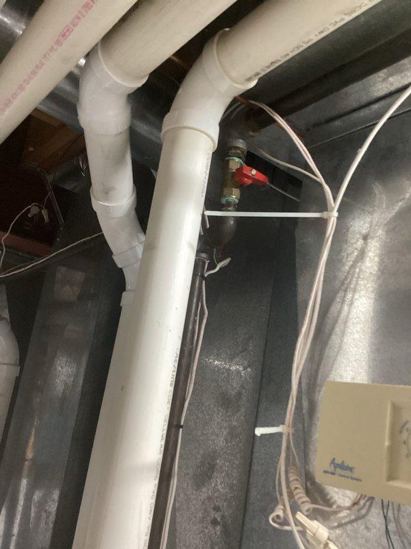 Performed routine maintenance inspection on HVAC system per agreement. Conducted pressure testing with digital diagnostic tool, recording pressure readings of 347 and 341 PSI. Inspected plumbing infrastructure and verified proper operation of shutoff valves in the mechanical space.