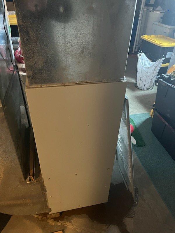 Diagnosed and serviced an aging furnace (10+ years) that was not producing heat. Inspection revealed significant dust accumulation throughout the system with particular concentration on the blower motor assembly and circuit board. Cleaned critical components, replaced worn electrical connections, and performed system reset which restored proper heating function. Unit is operational but showing signs of age-related wear that may require more extensive service in the near future.