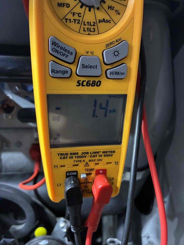 Performed scheduled maintenance on HVAC system. Conducted electrical diagnostics using Fieldpiece SC680 multimeter, verifying system voltage readings at 1.4V. Removed and replaced heavily soiled air filter showing significant dust accumulation.