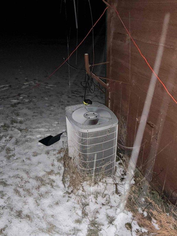 Conducted inspection of existing outdoor heat pump unit showing signs of age and wear, operating in snowy conditions. Examined electrical connections at the circuit breaker panel, noting current wiring configuration and load capacity. Prepared estimate for complete system replacement to improve efficiency and reliability.