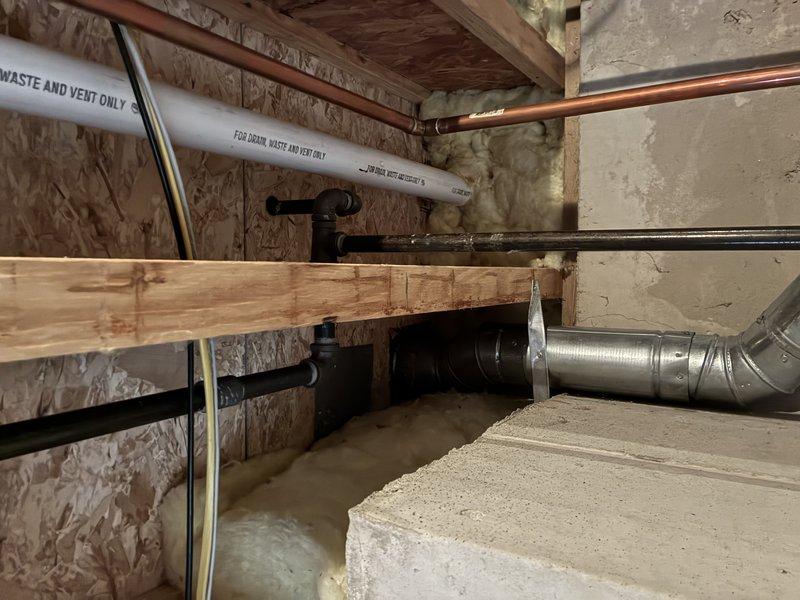 Installed a new tanked water heater in the basement utility area, connecting it to the existing copper supply lines with proper valves. Ensured all connections were secure and leak-free, with appropriate venting to meet current code requirements.