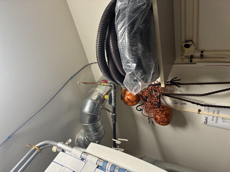 Successfully installed new tanked water heater in utility room, including proper connection of ductwork, electrical wiring, and associated piping components. Ensured all connections were secure and system was properly mounted to wall with appropriate brackets and hardware.